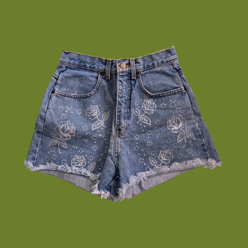 Vintage high waisted denim shorts with floral detailing